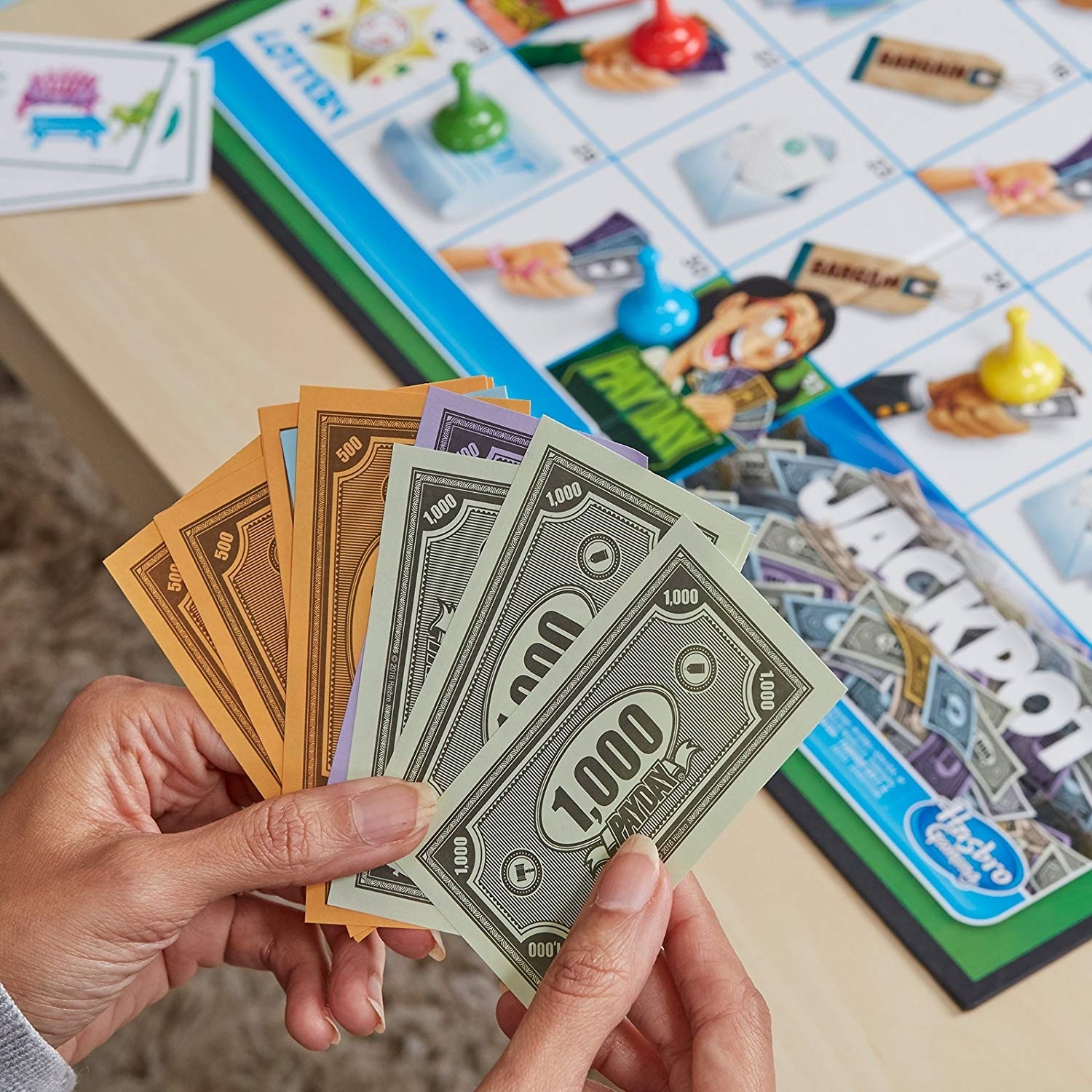 Money game 3. Настольная игра Hasbro игры час расплаты e0751. Деньги из настольной игры. Настольная игра с деньгами и карточками. Монополия час расплаты игра.